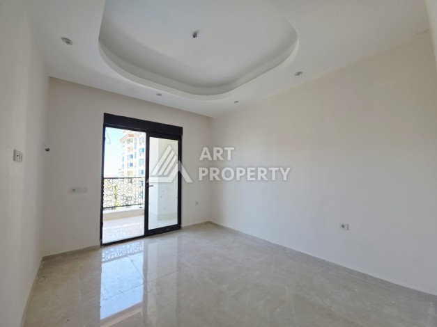 Большая квартира 1+1, 70 кв.м. Премиум резиденция в Махмутларе - Ракурс 14