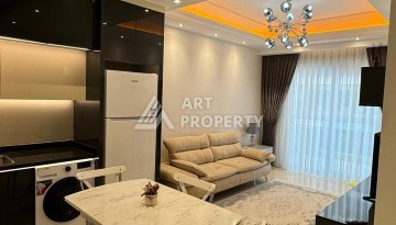 Меблированная квартира 1+1, 70 кв.м. в резиденции с собственным торговым центром в Махмутларе - Ракурс 24