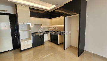 Квартира 1+1 с боковым видом на море в элитной резиденции, 70 кв.м. - Ракурс 9