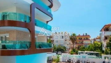 Квартира 1+1 в центре Алании в элитной резиденции, 60 кв.м. - Ракурс 1