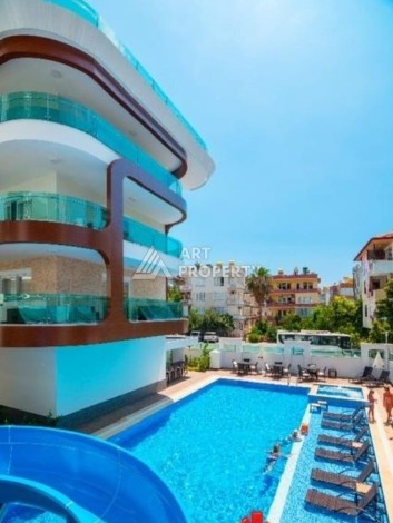 Квартира 1+1 в центре Алании в элитной резиденции, 60 кв.м. - Ракурс 0