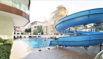 Квартира 1+1 в центре Алании в элитной резиденции, 60 кв.м. - Ракурс 3