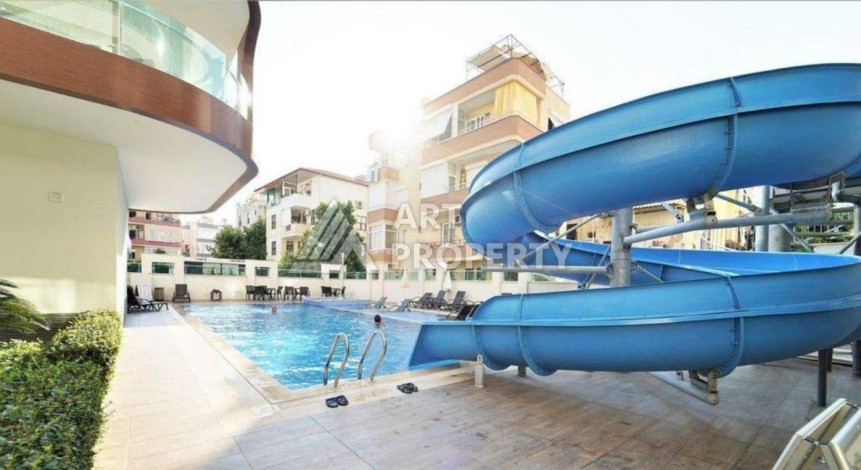 Квартира 1+1 в центре Алании в элитной резиденции, 60 кв.м. - Ракурс 2