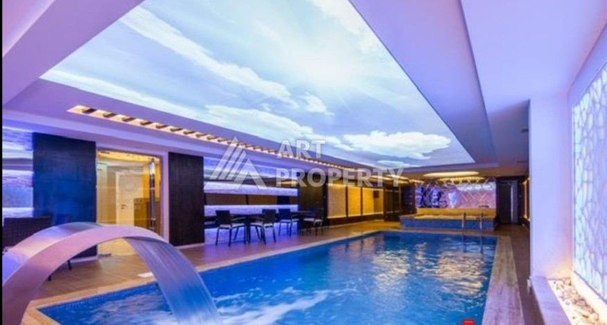 Квартира 1+1 в центре Алании в элитной резиденции, 60 кв.м. - Ракурс 3