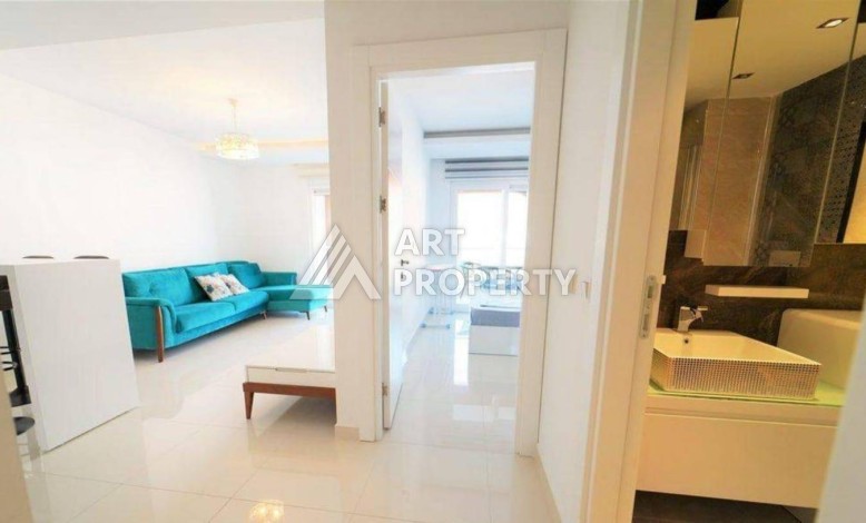 Квартира 1+1 в центре Алании в элитной резиденции, 60 кв.м. - Ракурс 10