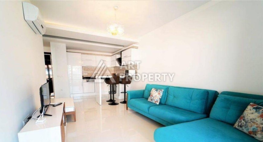 Квартира 1+1 в центре Алании в элитной резиденции, 60 кв.м. - Ракурс 11