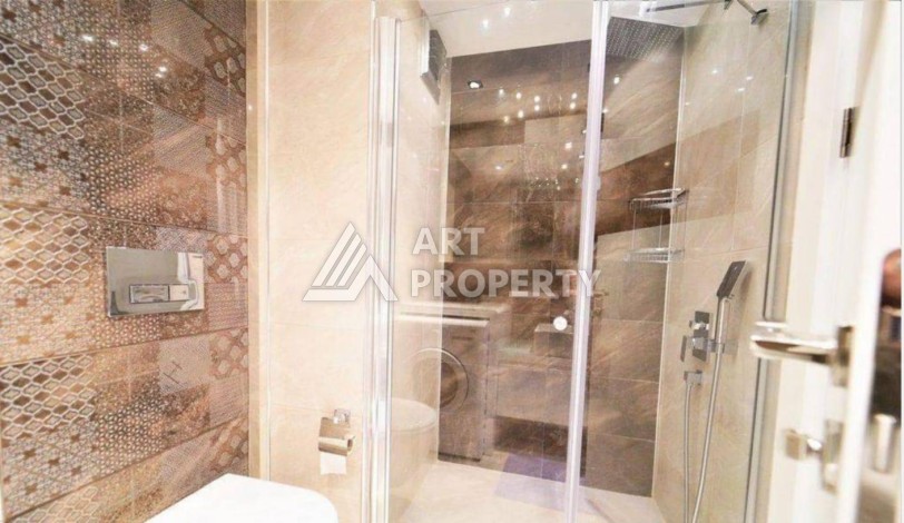 Квартира 1+1 в центре Алании в элитной резиденции, 60 кв.м. - Ракурс 18