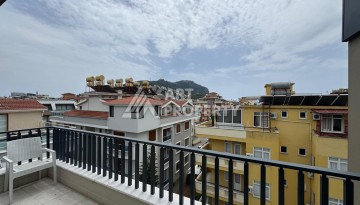 Двухуровневая квартира 2+1 возле пляжа Клеопатры, 110 кв.м. - Ракурс 32