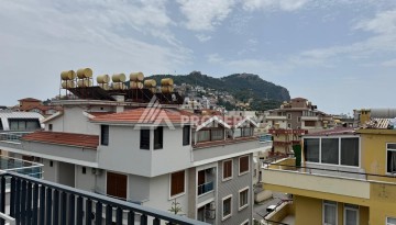 Двухуровневая квартира 2+1 возле пляжа Клеопатры, 110 кв.м. - Ракурс 35