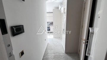 Квартира 1+1 в престижной резиденции Тосмура в 150 метрах от моря - Ракурс 8