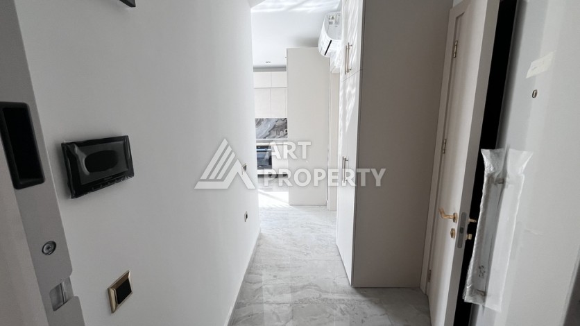 Квартира 1+1 в престижной резиденции Тосмура в 150 метрах от моря - Ракурс 7