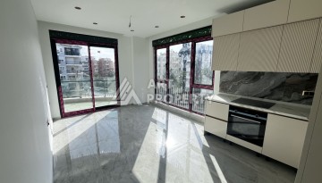 Квартира 1+1 в престижной резиденции Тосмура в 150 метрах от моря - Ракурс 11