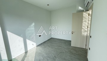 Квартира 1+1 в престижной резиденции Тосмура в 150 метрах от моря - Ракурс 12