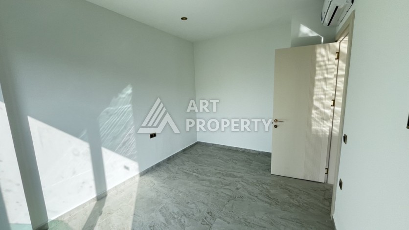 Квартира 1+1 в престижной резиденции Тосмура в 150 метрах от моря - Ракурс 11