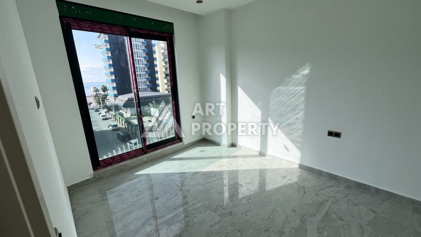 Квартира 1+1 в престижной резиденции Тосмура в 150 метрах от моря - Ракурс 15