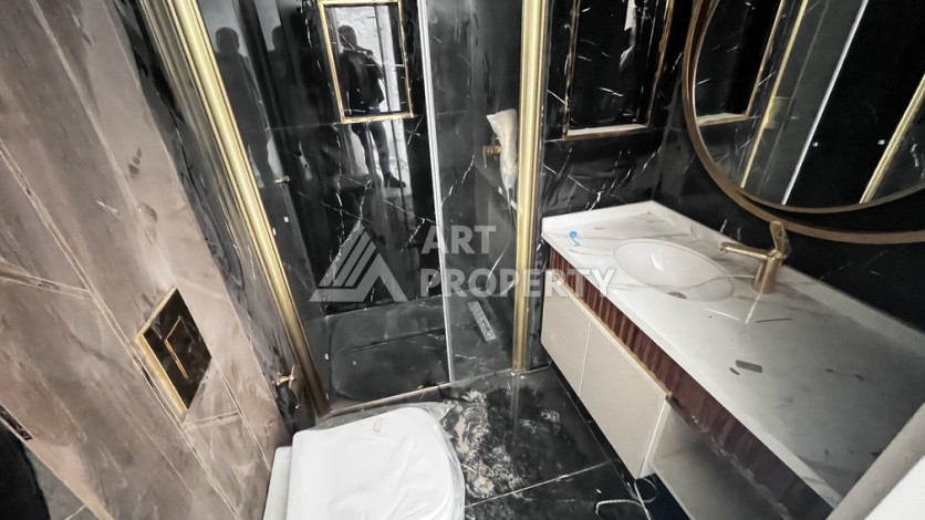 Квартира 1+1 в престижной резиденции Тосмура в 150 метрах от моря - Ракурс 17