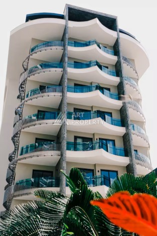 Квартира 1+1 в престижной резиденции Тосмура в 150 метрах от моря - Ракурс 1