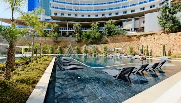 Квартира 1+1 в престижной резиденции Тосмура в 150 метрах от моря - Ракурс 1