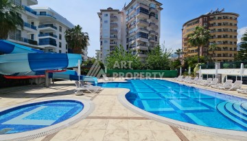 Квартира 1+1 в престижном жилом комплексе в центре Алании, 60 кв.м. - Ракурс 1