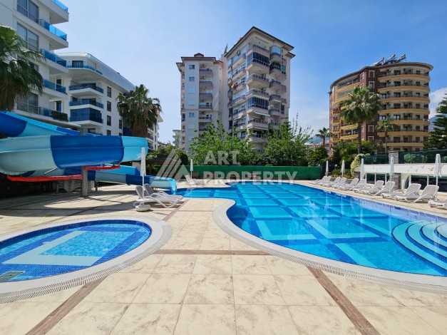 Квартира 1+1 в престижном жилом комплексе в центре Алании, 60 кв.м. - Ракурс 0