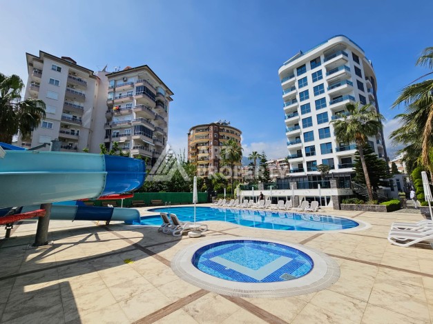 Квартира 1+1 в престижном жилом комплексе в центре Алании, 60 кв.м. - Ракурс 14