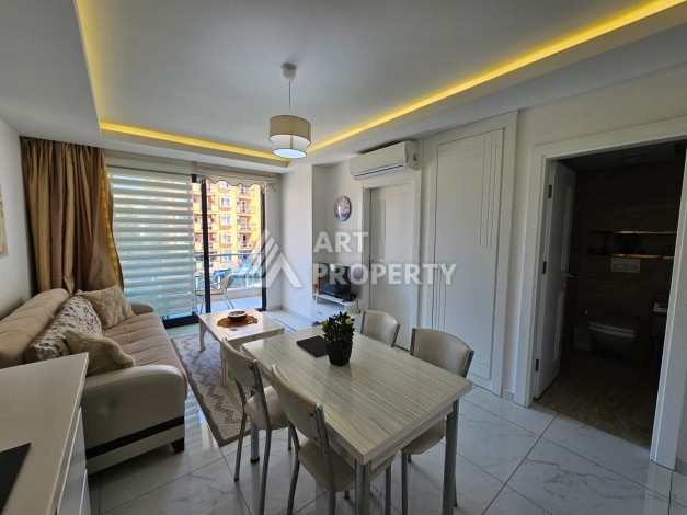 Квартира 1+1 в престижном жилом комплексе в центре Алании, 60 кв.м. - Ракурс 16