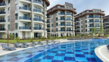 Доступная квартира 1+1 в элитном комплексе района Оба с лицензией на суточную аренду - Ракурс 1