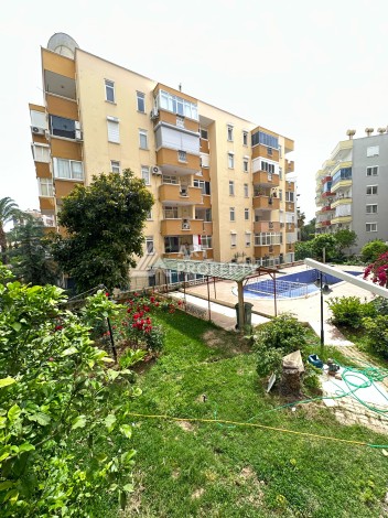 Бюджетная квартира 2+1 в районе Тосмур, всего 300 метров от моря - Ракурс 0