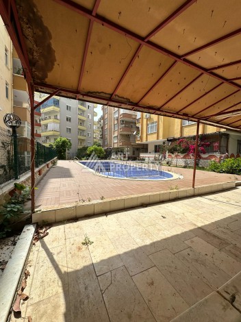 Бюджетная квартира 2+1 в районе Тосмур, всего 300 метров от моря - Ракурс 18