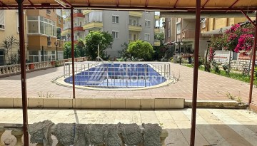 Бюджетная квартира 2+1 в районе Тосмур, всего 300 метров от моря - Ракурс 21