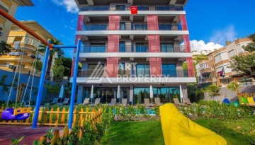 Квартира 1+1 в 450 м от пляжа Клеопарты. Стильный бутик-комплекс в центре Алании - Ракурс 1