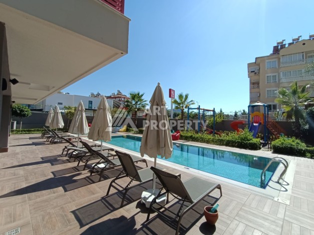 Квартира 1+1 в 450 м от пляжа Клеопарты. Стильный бутик-комплекс в центре Алании - Ракурс 1