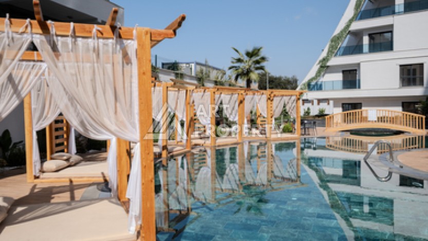 Современная квартира 1+1 в новой резиденции, центр Махмутлара, 55 кв.м. - Ракурс 1