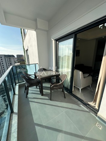 Современная квартира 1+1 в новой резиденции, центр Махмутлара, 55 кв.м. - Ракурс 9