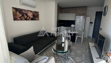 Современная квартира 1+1 в новой резиденции, центр Махмутлара, 55 кв.м. - Ракурс 12