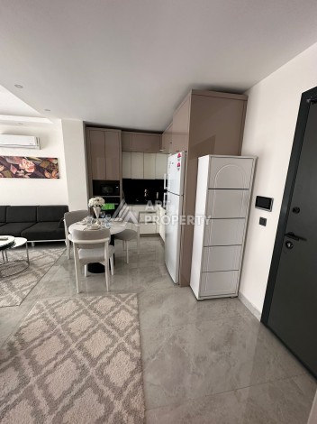 Современная квартира 1+1 в новой резиденции, центр Махмутлара, 55 кв.м. - Ракурс 13