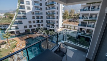 Меблированная квартира 1+1 в престижном комплексе в центре Махмутлара, 45 кв.м. - Ракурс 1