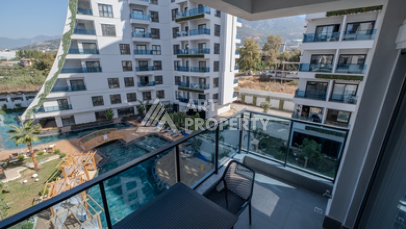 Меблированная квартира 1+1 в престижном комплексе в центре Махмутлара, 45 кв.м. - Ракурс 0