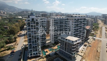 Меблированная квартира 1+1 в престижном комплексе в центре Махмутлара, 45 кв.м. - Ракурс 6