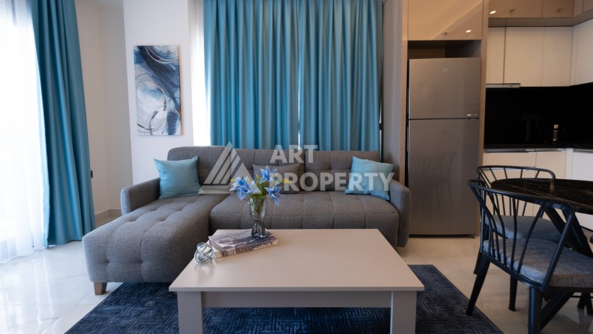 Меблированная квартира 1+1 в престижном комплексе в центре Махмутлара, 45 кв.м. - Ракурс 9