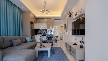 Меблированная квартира 1+1 в престижном комплексе в центре Махмутлара, 45 кв.м. - Ракурс 11