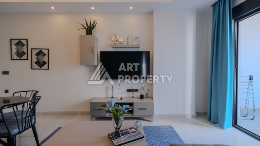 Меблированная квартира 1+1 в престижном комплексе в центре Махмутлара, 45 кв.м. - Ракурс 12