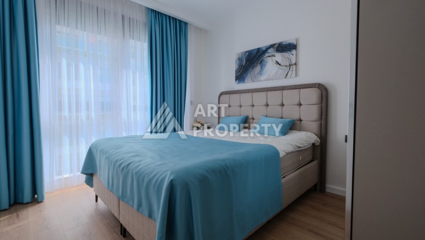 Меблированная квартира 1+1 в престижном комплексе в центре Махмутлара, 45 кв.м. - Ракурс 14