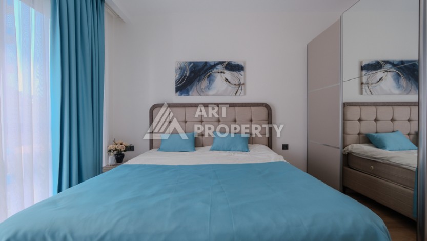 Меблированная квартира 1+1 в престижном комплексе в центре Махмутлара, 45 кв.м. - Ракурс 15