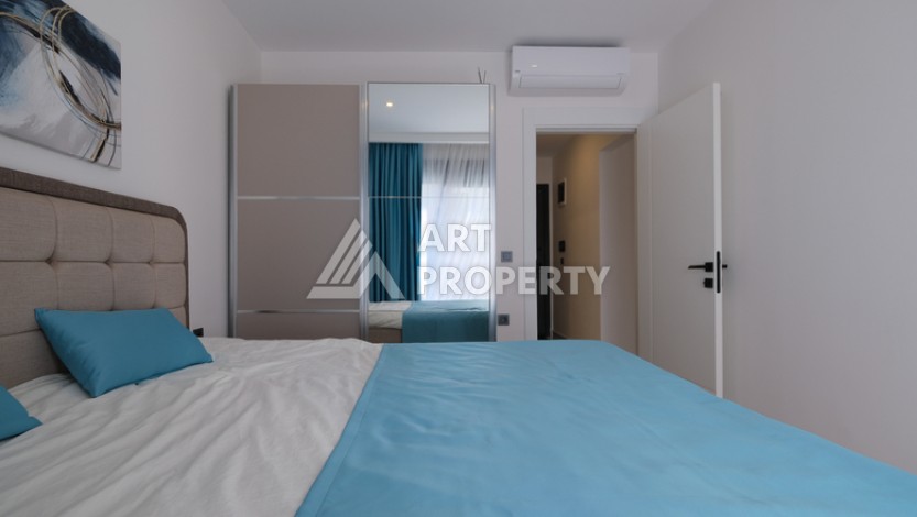 Меблированная квартира 1+1 в престижном комплексе в центре Махмутлара, 45 кв.м. - Ракурс 16