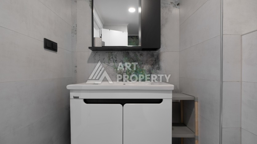 Меблированная квартира 1+1 в престижном комплексе в центре Махмутлара, 45 кв.м. - Ракурс 18