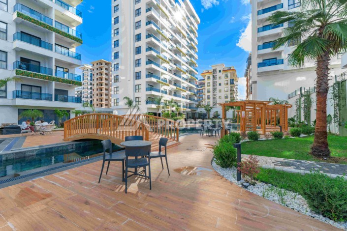 Элитная недвижимость в Махмутларе. Две квартиры 1+1 площадью 55 кв.м. - Ракурс 0