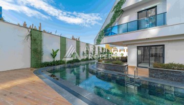 Элитная недвижимость в Махмутларе. Две квартиры 1+1 площадью 55 кв.м. - Ракурс 4