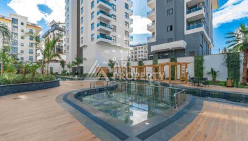 Элитная недвижимость в Махмутларе. Две квартиры 1+1 площадью 55 кв.м. - Ракурс 5