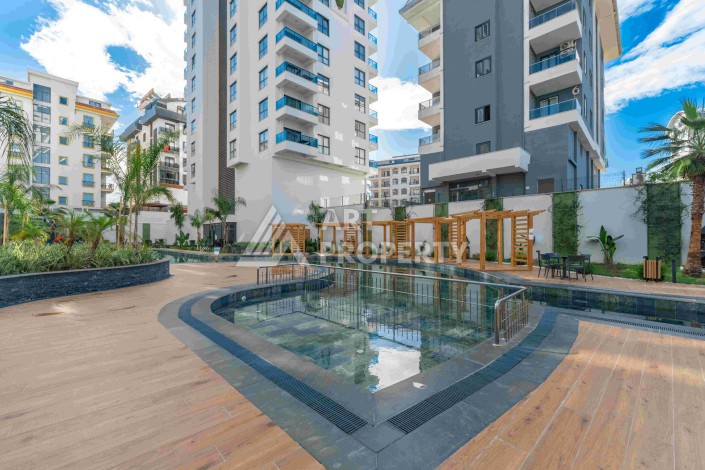 Элитная недвижимость в Махмутларе. Две квартиры 1+1 площадью 55 кв.м. - Ракурс 4